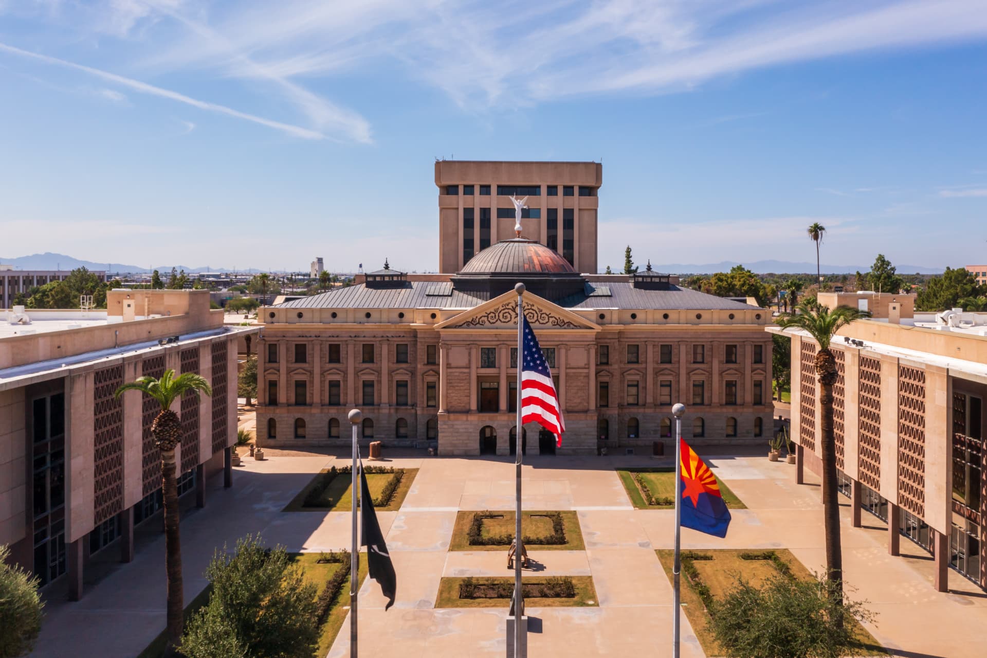 Arizona State Capitol with American and Arizona flags